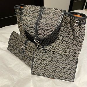 Black Coach backpack, wallet and checkbook.